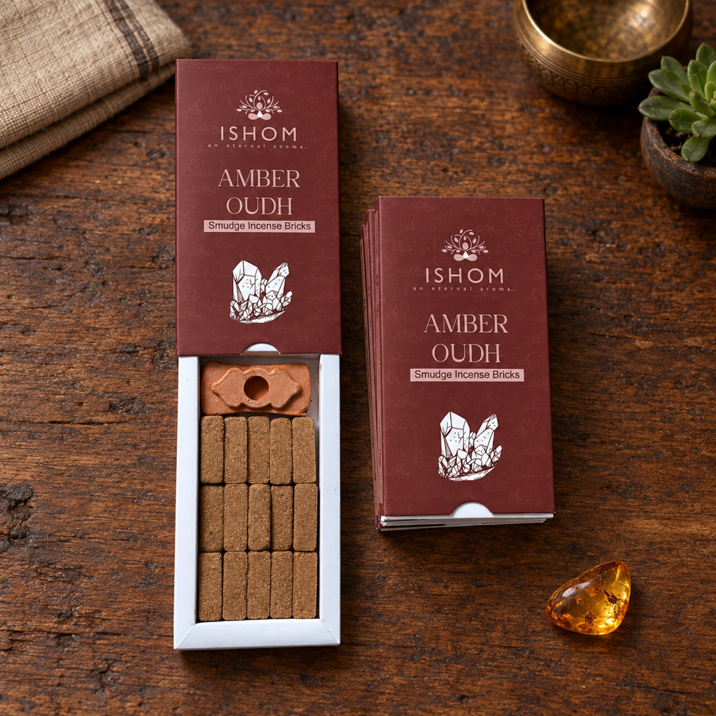 Open ISHOM Amber Oudh incense box showing 15 smudge bricks and burner