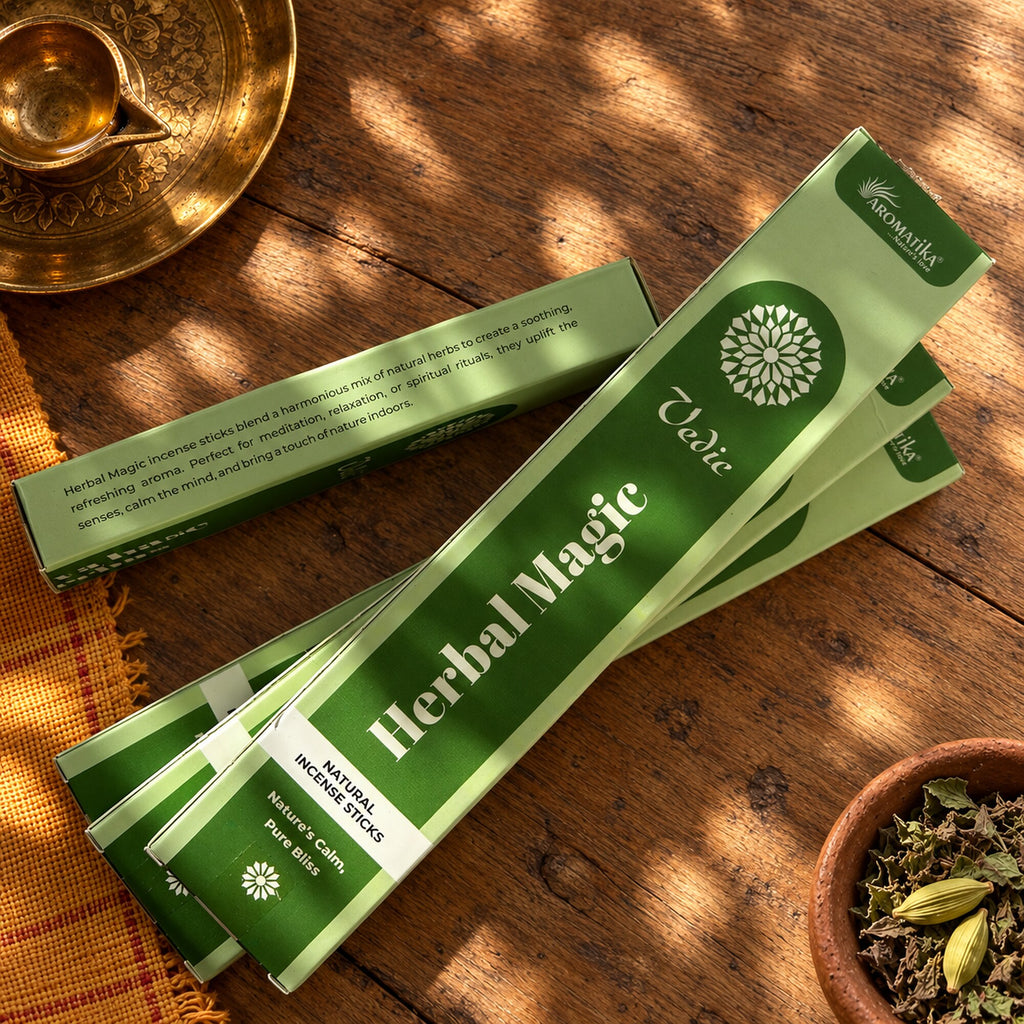 Aromatika Herbal Magic natural incense stick boxes displayed with herbs on a rustic Ayurveda inspired bohemian wood