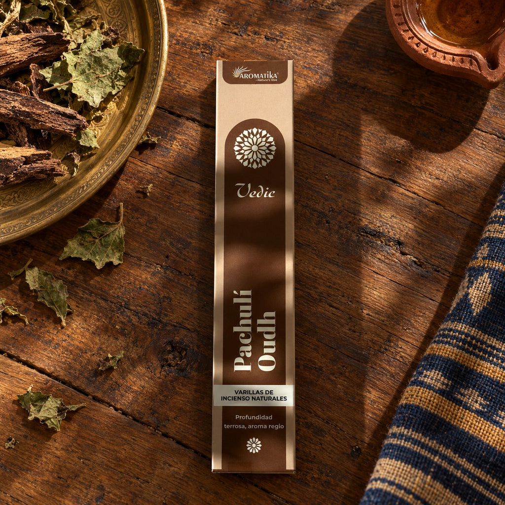 Aromatika Vedic Patchouli Oudh natural incense sticks in brown packaging on rustic wooden Ayurveda inspired bohemian surface