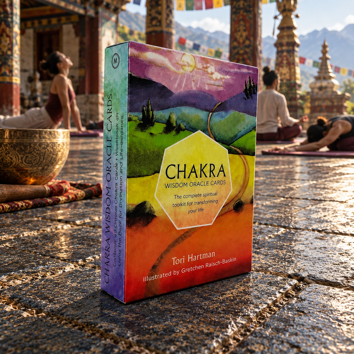 Chakra Wisdom Oracle Cards boxed deck displayed in a meditation and yoga setting