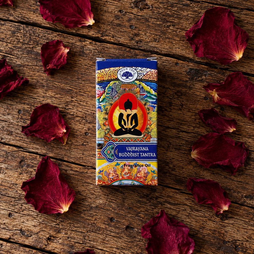 Green Tree Vajrayana Buddhist Tantra Fragrance Oil box displayed on rustic wood with dried rose petals.