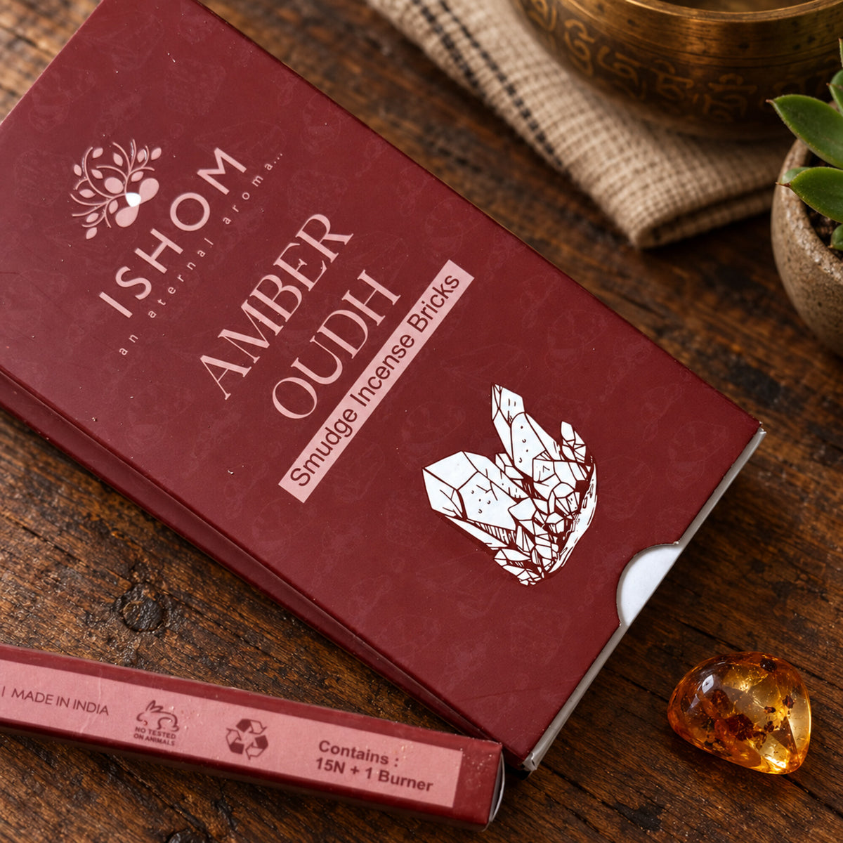  ISHOM Amber Oudh smudge incense packaging showing 15 bricks and one burner